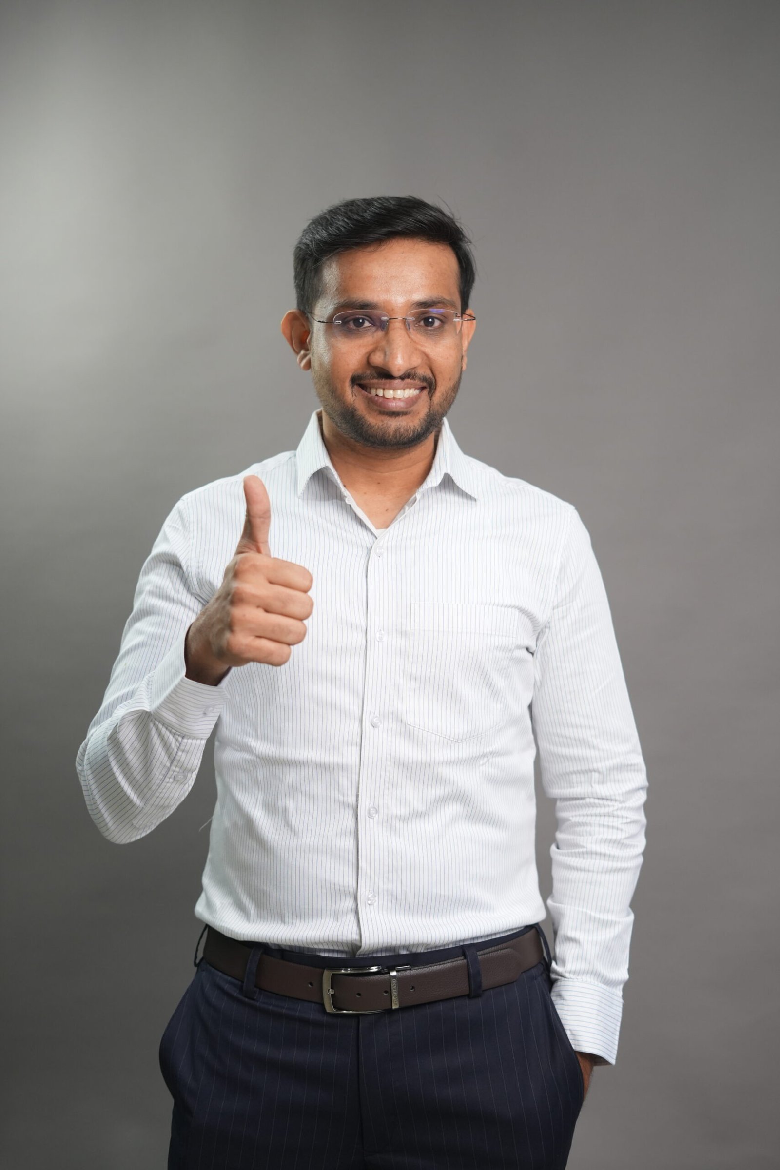 Dr. Sai Kumar with a newborn patient