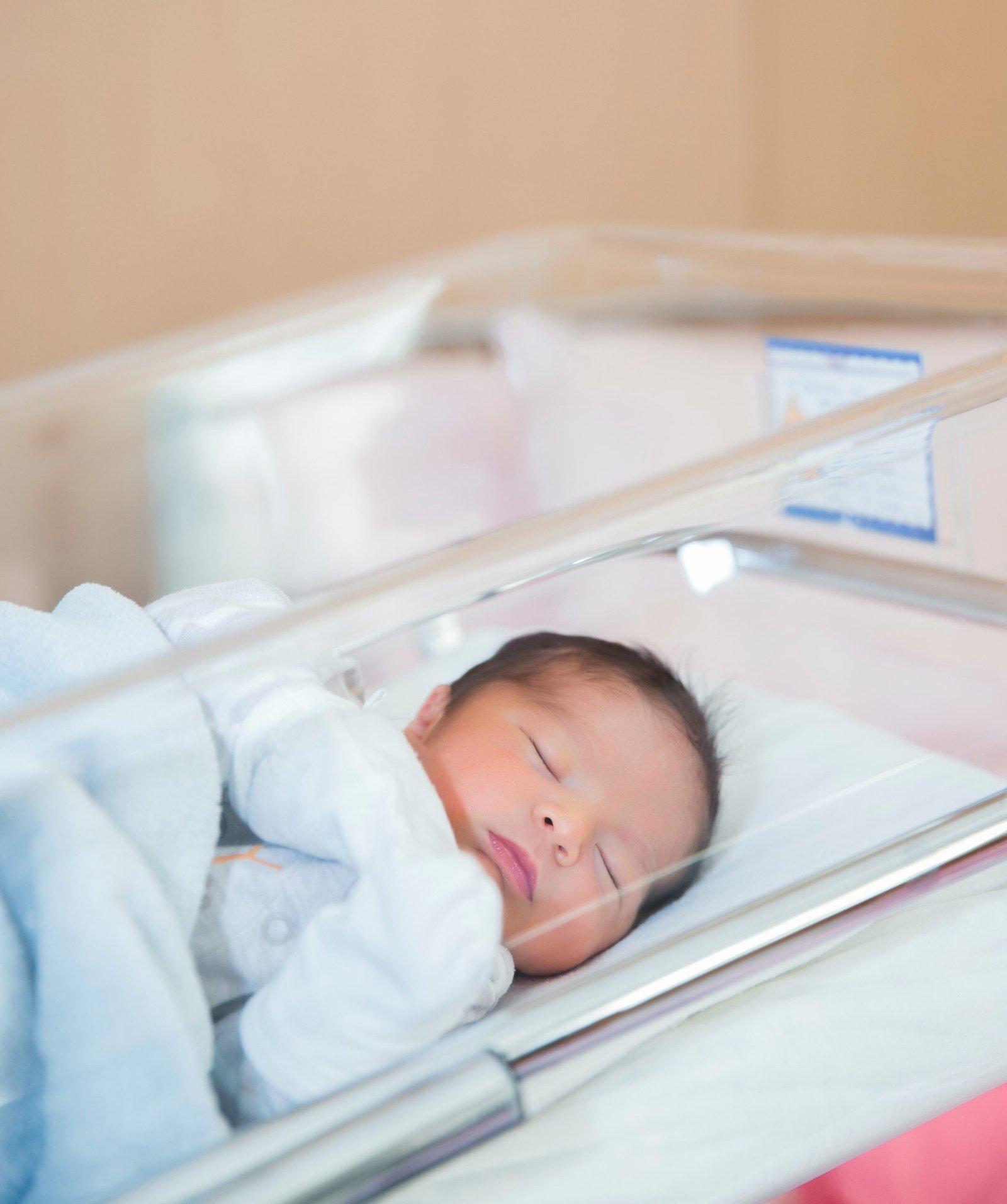 Newborn baby receiving NICU care