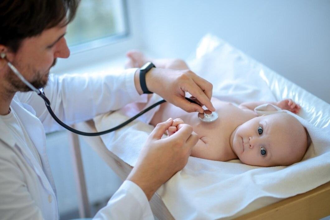 Neonatologist examining a newborn